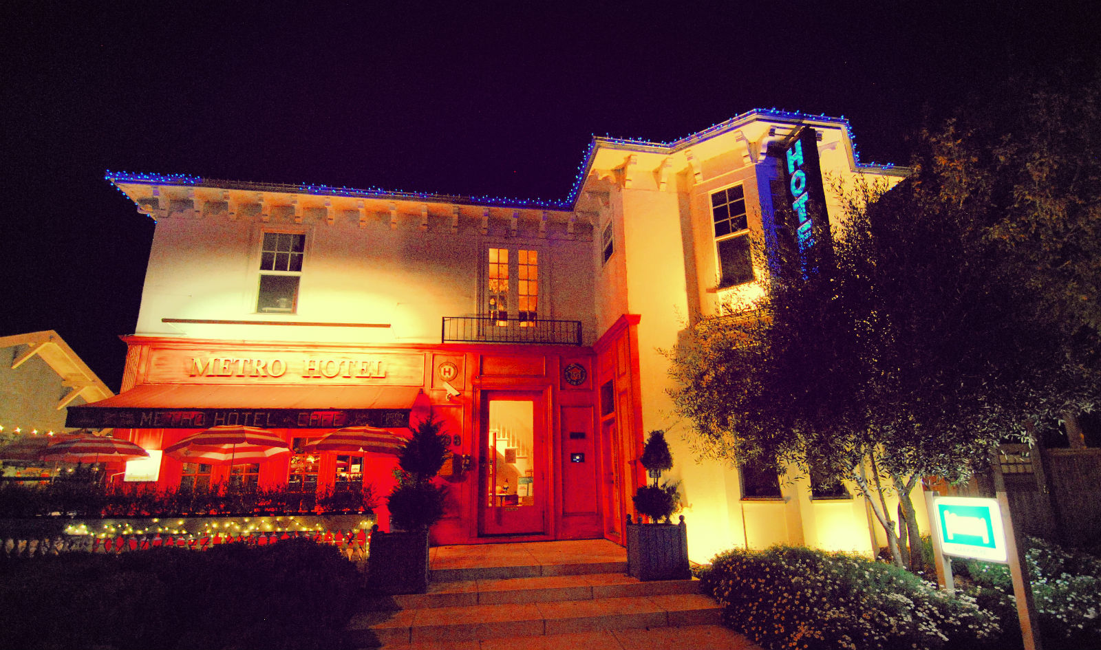 Metro Hotel exterior at night