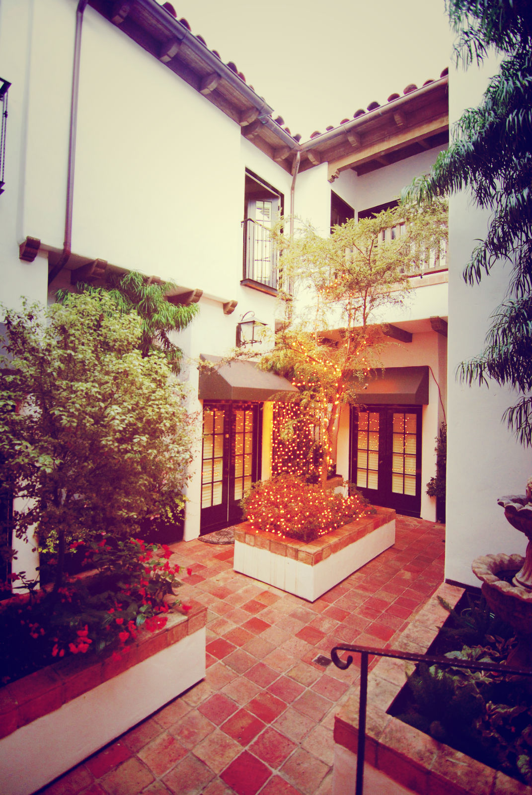 Early evening in the garden courtyard at Cypress Inn, Carmel, CA